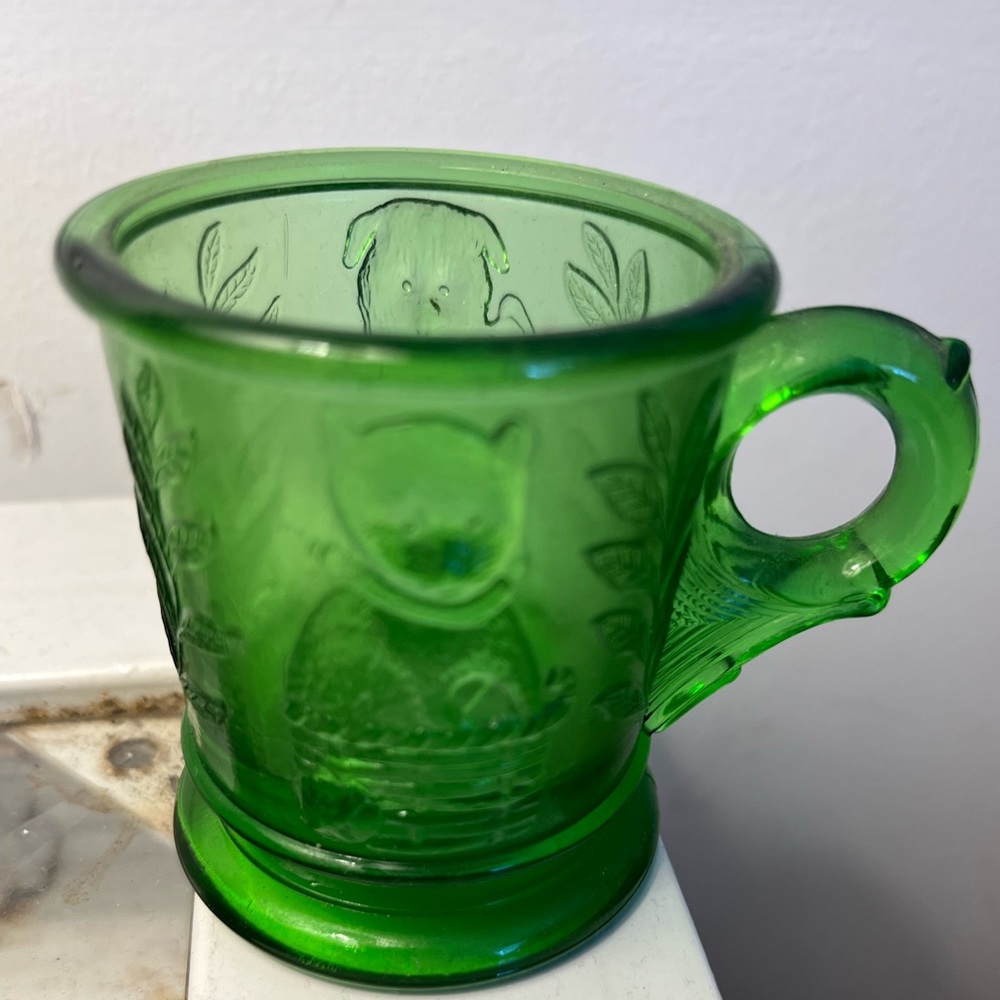 Mosser green “Vaseline” glass children’s cup. $30 each or $50 for both